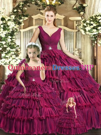 Burgundy Backless Quinceanera Gown Ruffled Layers Sleeveless Floor Length