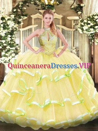 Yellow Halter Top Neckline Beading and Ruffled Layers Quince Ball Gowns Sleeveless Lace Up